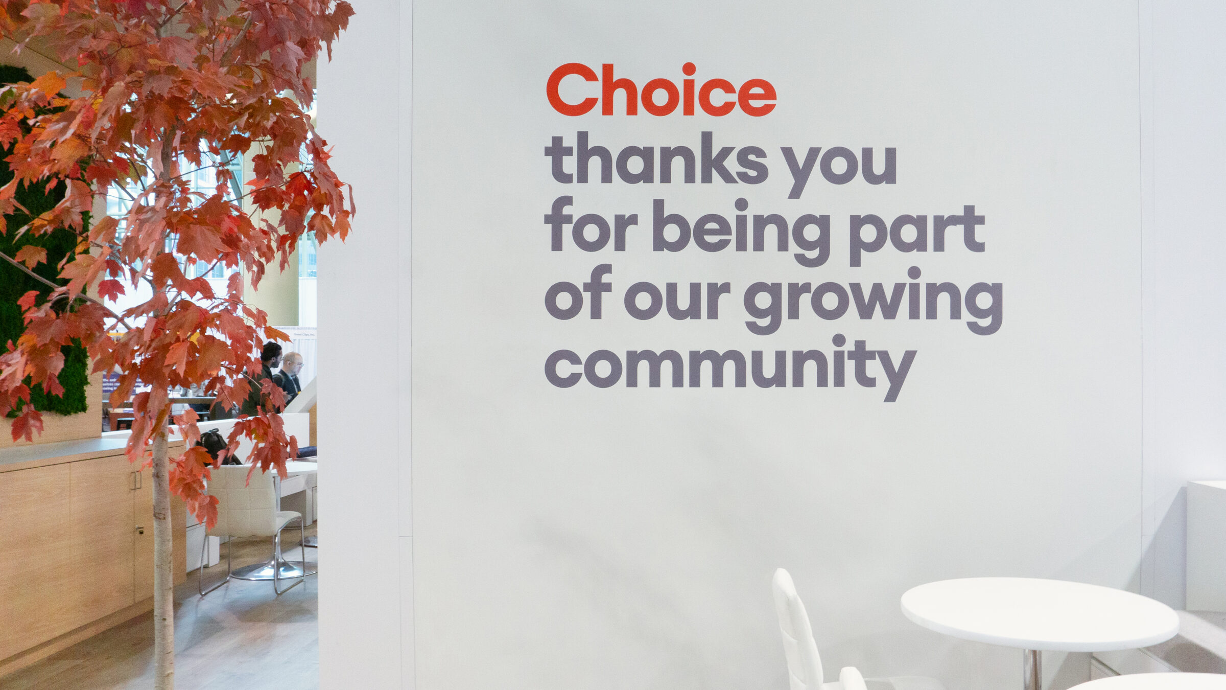 wall signage with "choice thanks you for being part of our growing community"