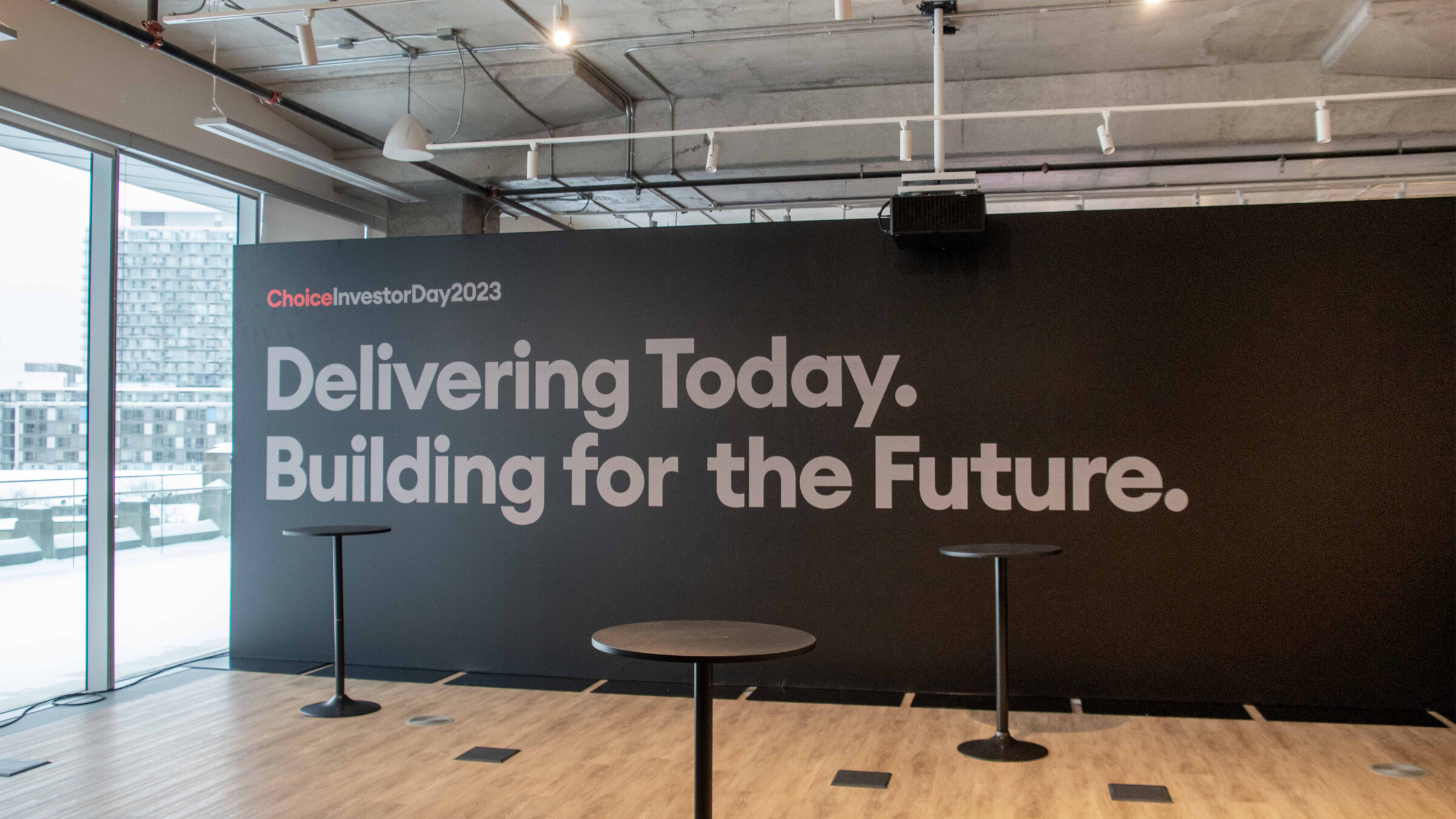 wall signage with choice investor day logo and "delivering today. building for the future."